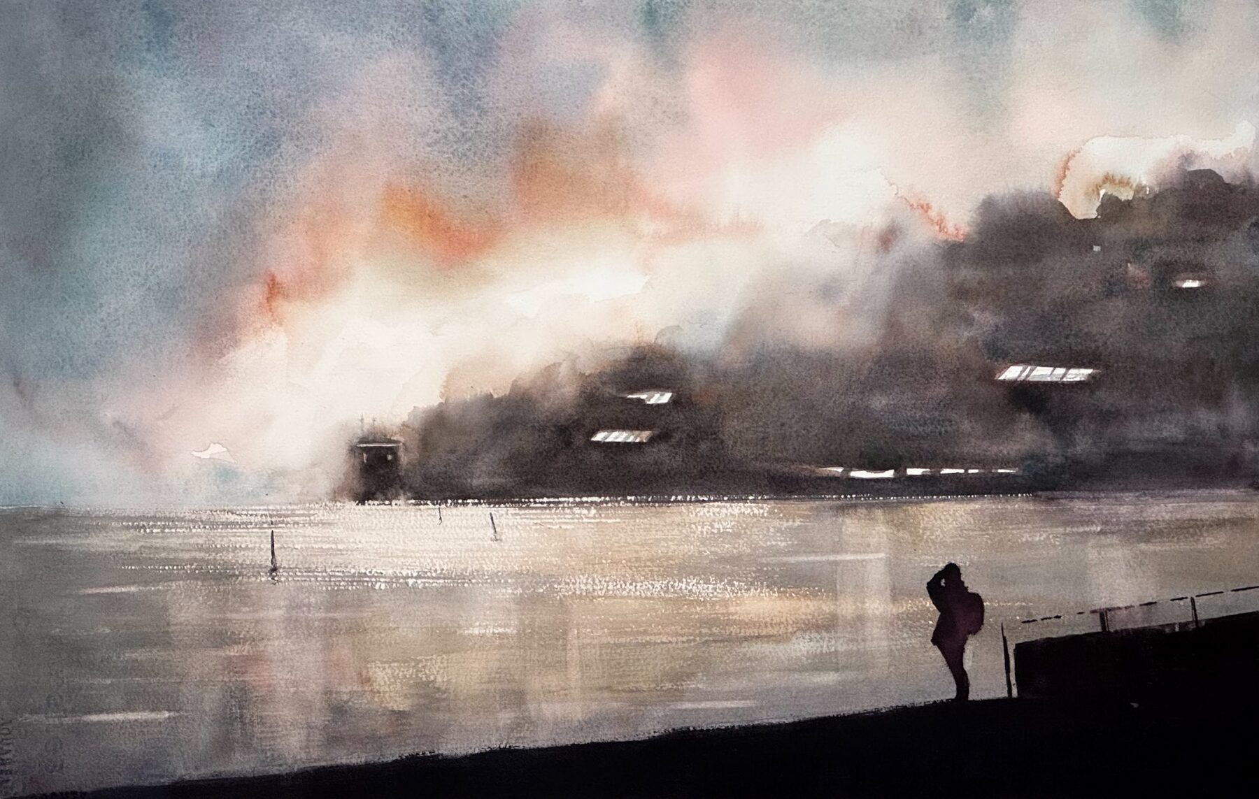 Dimhöljd vy över Stadsgården och vattnet.