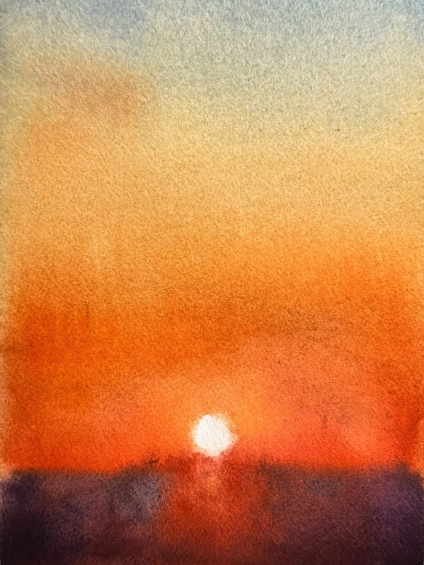 Solnedgång i varma orange toner.