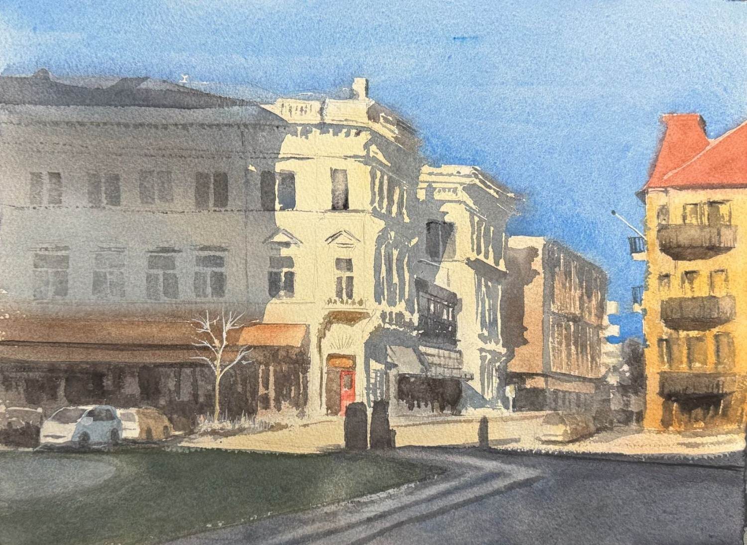 Stadshotellet i Karlskrona med ljusa fasader längs en stilla gata.